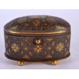 A 19TH CENTURY MIDDLE EASTERN TOLEDO GOLD INLAID BOX decorated with figures and star shaped motifs.