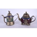 TWO CHINESE REPUBLICAN PERIOD WHITE METAL AND HARDSTONE TEAPOTS overlaid in cloisonne. 11 cm wide. (