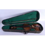 A CASED SINGLE PIECE BACK VIOLIN with bow. Violin 59 cm long, length of back 34.5 cm long.