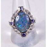 A SILVER AND OPAL RING. 7.5 grams. R/S.