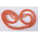 A CORAL NECKLACE. 138 cm long.