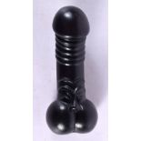 A JAPANESE CARVED BOXWOOD EROTIC NETSUKE modelled as a phallus 11 cm wide.