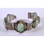 AN EARLY 20TH CENTURY CHINESE SILVER JADEITE AND ENAMEL BRACELET Late Qing/Republic. 31 grams. 15 cm