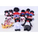 A collection of Robertson & Co "Golly its Good dolls " together with other dolls largest 47 CM