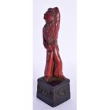 AN UNUSUAL EARLY 20TH CENTURY CHINESE RED LACQUER FIGURE OF A DANCER Late Qing/Republic. 14 cm high.