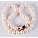 A PEARL NECKLACE. 44 cm long.