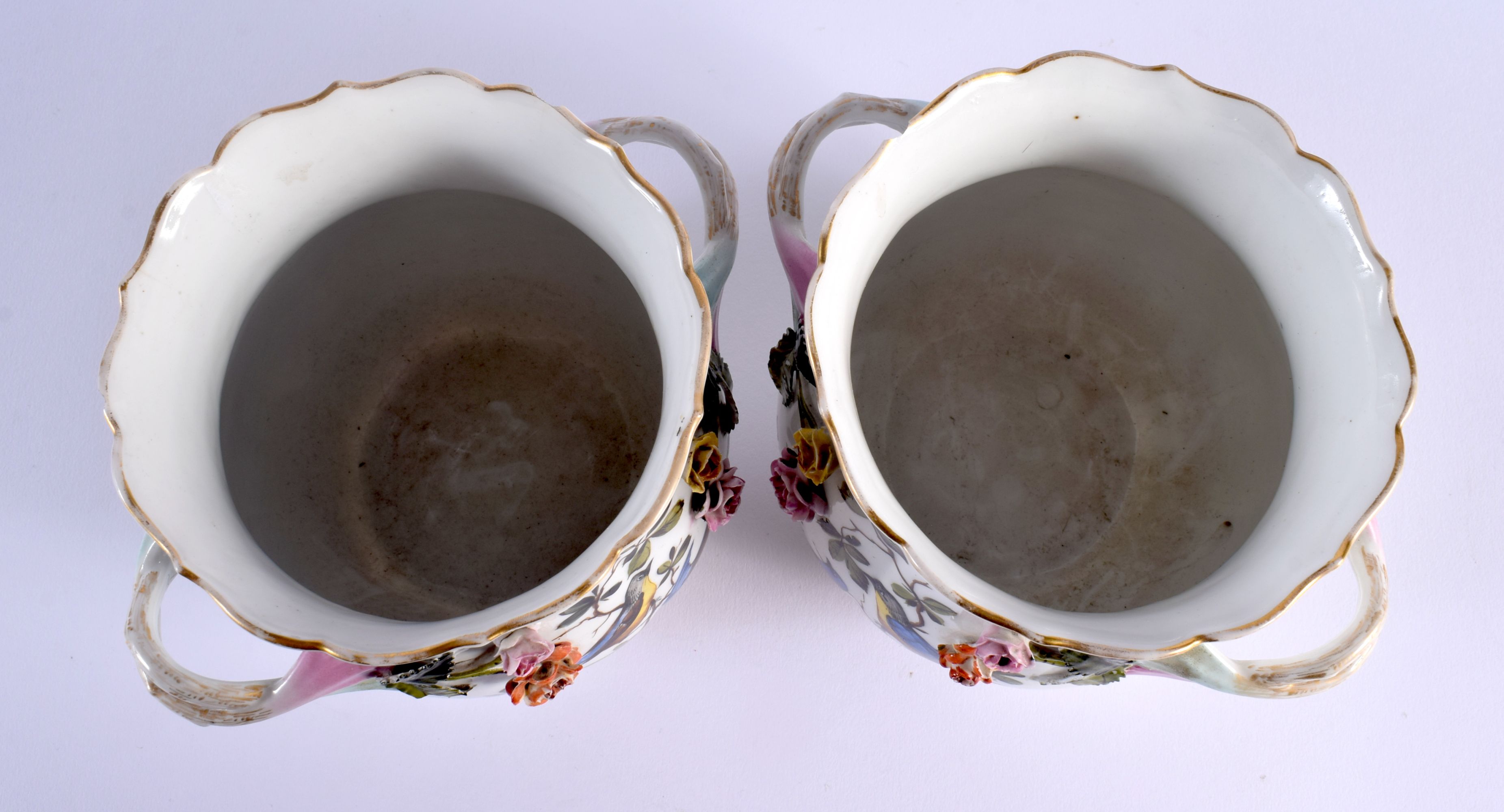 A PAIR OF 19TH CENTURY GERMAN TWIN HANDLED ENCRUSTED PORCELAIN JARDINIERES painted with birds. 17 cm - Bild 3 aus 4