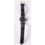 A ROLEX BLACK DIAL STAINLESS STEEL WRISTWATCH. 3.75 cm wide inc winder.