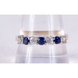 A 14CT GOLD DIAMOND SAPPHIRE AND DIAMOND RING. 2.6 grams. S.