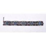 A WHITE METAL AND ENAMEL BRACELET. 23.7cm long, weight 23.7g