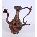 An Islamic gilded bronze ewer 23cm.