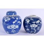 TWO 19TH CENTURY CHINESE BLUE AND WHITE GINGER JARS Kangxi style. Largest 16 cm x 10 cm. (2)