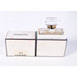 A BOXED CHANEL BOTTLE. 6.5 cm x 4 cm.