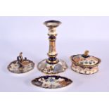 Royal Crown Derby candlestick, powder box and cover, ring stand and a pin tray painted with coloured