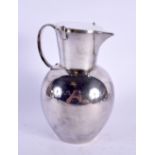 AN ARTS AND CRAFTS WMF SILVER PLATED WATER JUG. 21 cm high.
