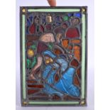 AN UNUSUAL STAINED GLASS WINDOW depicting figures in erotic pursuits. 26 cm x 18 cm.