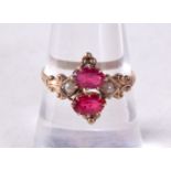 A 10CT GOLD AND RUBY RING. 1.6 grams. P.