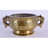 A 19TH CENTURY CHINESE TWIN HANDLED BRONZE CENSER Qing, decorated with birds and foliage. 17 cm wide