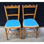 A pair of upholstered carved wooden chairs (2)