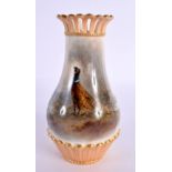 Royal Worcester vase, shape 1061 G with pierced neck painted with a pheasant in landscape by Jas. St