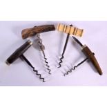 FOUR ANTIQUE CORKSCREWS two with horn handles, one with antler & the other bone. Largest 15 cm x 8 c