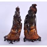 A PAIR OF 19TH CENTURY CHINESE CARVED BUFFALO HORN FIGURES Qing. Largest 18 cm high.