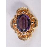 AN ANTIQUE YELLOW METAL AMETHYST BROOCH. 7.4 grams. 3.5 cm x 3 cm.