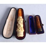 TWO CASED CHEROOT PIPES. Largest 9 cm x 2.5 cm. (2)