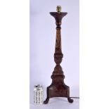 A LARGE 18TH CENTURY EUROPEAN PROVINCIAL CARVED WOOD LAMP. 59 cm high.