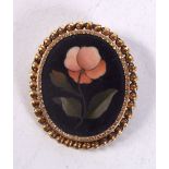 AN 18CT GOLD PIETRA DURA BROOCH. 4.25 cm x 3.5 cm.