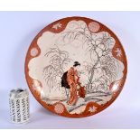 A LARGE 19TH CENTURY JAPANESE MEIJI PERIOD KUTANI DISH painted with a geisha and child within a land