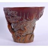 A CHINESE CARVED BUFFALO HORN TYPE LIBATION CUP 20th Century. 418 grams. 11 cm x 11 cm.