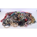 A huge collection of costume jewellery/necklaces. (Qty)
