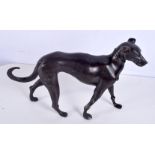 A large bronze dog 20 x 33 x 8 cm