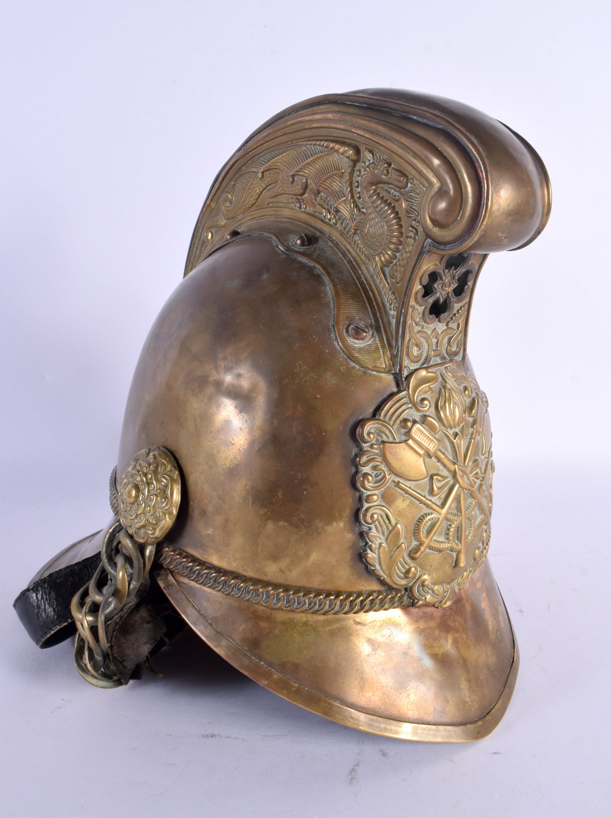 AN ANTIQUE FIREMANS HELMET. 24 cm x 20 cm. - Image 2 of 4