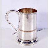 A large Silver plated tankard 17.5 cm.