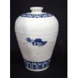 A Chinese porcelain blue and white Meiping vase decorated with fish 29 cm.