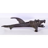 AN ANTIQUE BRONZE DRAGON FISH NUT CRACKER. 22.5 cm x 6 cm.