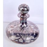 A VINTAGE SILVER OVERLAID GLASS SCENT BOTTLE. 569 grams. 15 cm x 15 cm.