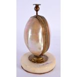 A 19TH CENTURY FRENCH MOTHER OF PEARL GILT METAL SCENT BOTTLE HOLDER in the form of an egg. 14.5 cm