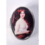 A CONTINENTAL SILVER PILL BOX DECORATED WITH A NUDE FEMALE. Stamped Sterling, 1.2cm x 3.7cm x 2.8cm