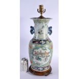 A LARGE 19TH CENTURY CHINESE TWIN HANDLED FAMILLE ROSE VASE Qing, painted with figures and calligrap