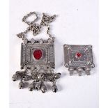 TWO ANTIQUE MIDDLE EASTERN YEMENI SILVER AND GEM STONE PENDANTS. 100 grams. Largest 37 cm long, pend
