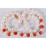 A CORAL AND PEARL NECKLACE WITH A 14CT GOLD CLASP. Stamped 14K, Length 40cm, Pearl size 6.5mm