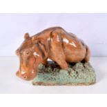 A large glazed pottery Hippopotamus 17 x 20 cm.