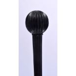 AN ANTIQUE EBONISED WALKING CANE. 70 cm long.