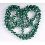 A MALACHITE BEAD NECKLACE. Length 92cm, bead size 9.5mm, weight 91g