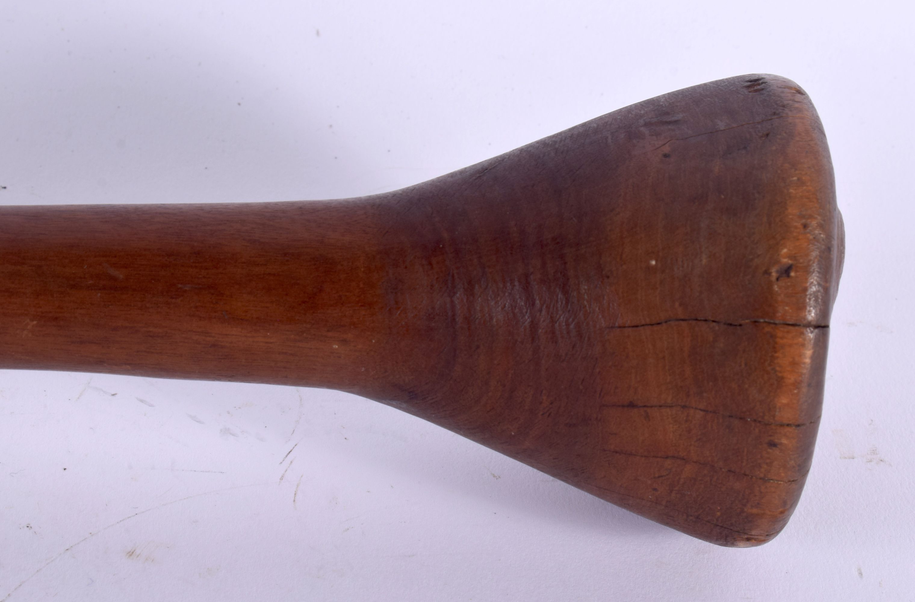 AN EARLY 20TH CENTURY TRIBAL CARVED WOOD THROWING CLUB with dimpled terminal. 47 cm long. - Image 5 of 8