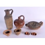 A GROUP OF ANTIQUITIES in various forms and sizes. Largest 11 cm wide. (7)