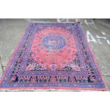 AN EARLY 20TH CENTURY PERSIAN SAROUK ROOM SIZE RUG. 340 cm x 251 cm.